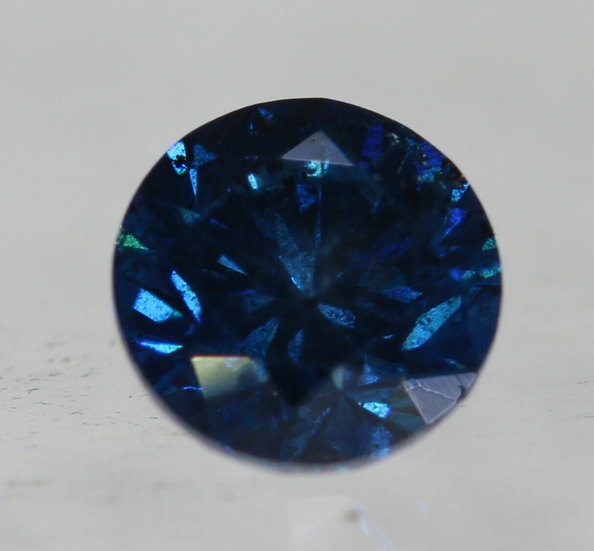 0.13 Carat Fancy Vivid Blue Round Brilliant Enhanced Natural Loose Diamond 3.27m