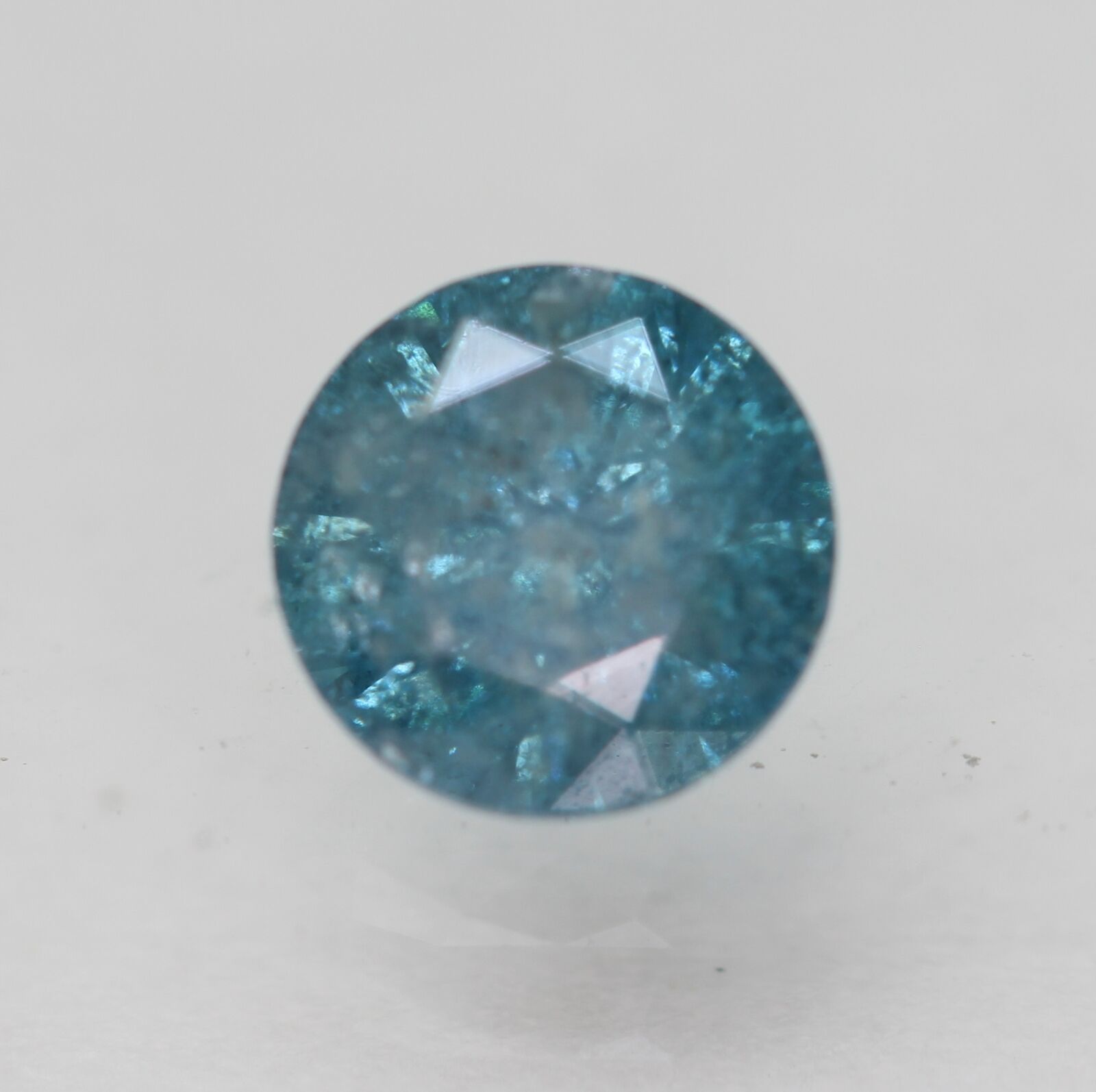 Cert 0.55 Carat Sky Blue Round Brilliant Enhanced Natural Diamond 5.08mm 3vg